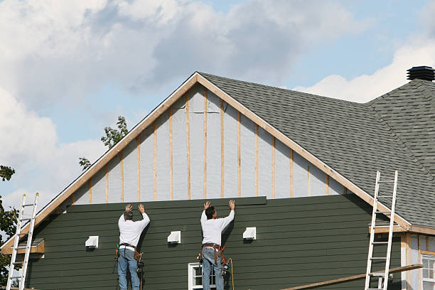 Professional Siding Contractor technician working in Madison, IL